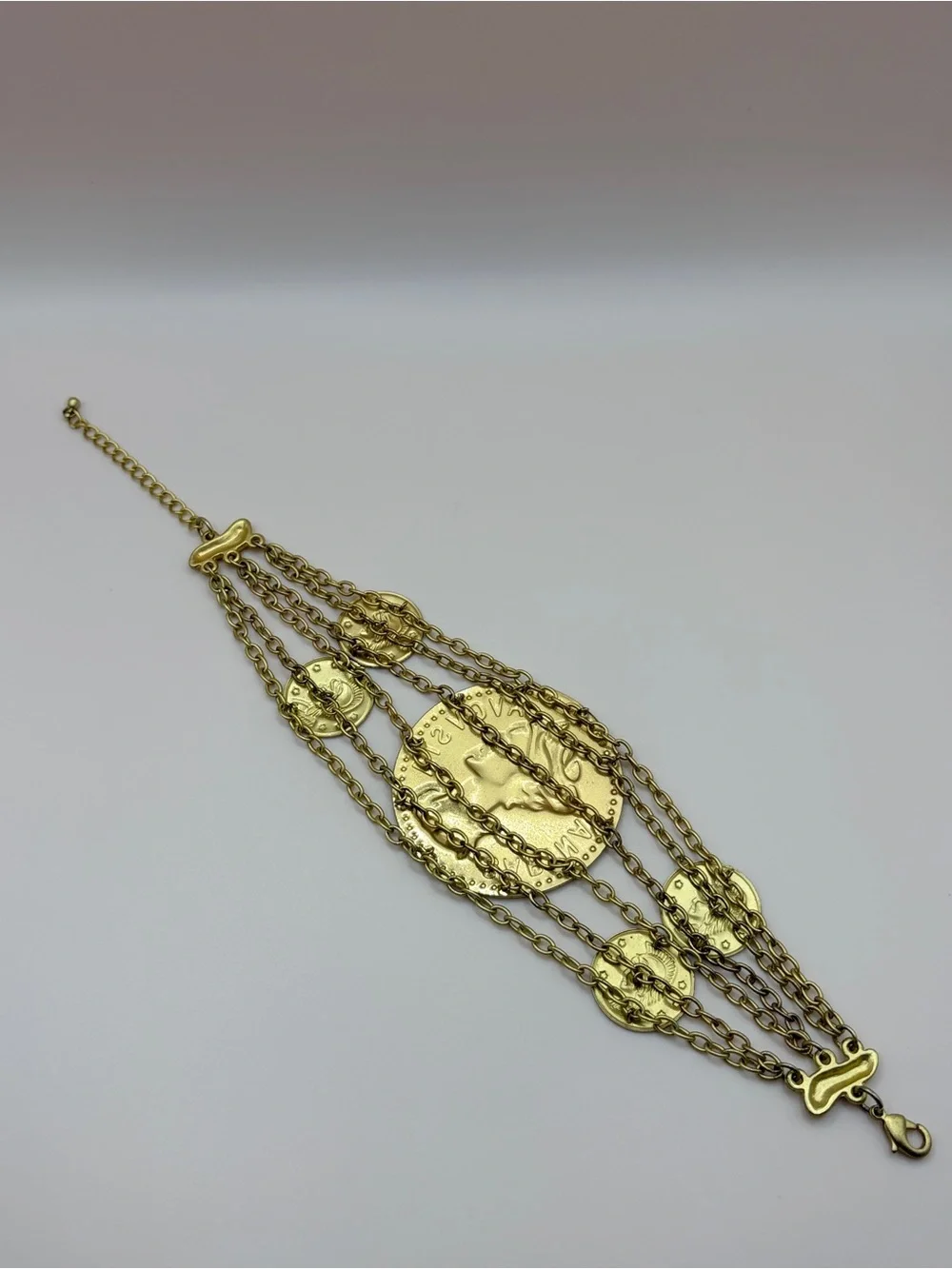 Bold Gold Tone Sabina Augusta Costume Coin Statement Bracelet